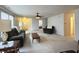 Bright living room featuring a comfortable seating area and multiple access points at 6896 Maywood Cir, Avon, IN 46123