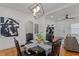 A cozy dining area featuring a modern light fixture, stylish decor, and seating for four at 729 W 32Nd St, Indianapolis, IN 46208