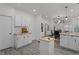 Open kitchen with stylish white cabinets and sleek butcher block countertops at 729 W 32Nd St, Indianapolis, IN 46208