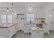 Modern kitchen featuring new white cabinets and butcher block countertops at 729 W 32Nd St, Indianapolis, IN 46208
