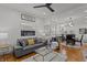 Open floorplan living room featuring hardwood floors and views to kitchen at 729 W 32Nd St, Indianapolis, IN 46208