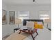 Bright main bedroom with a decorative pillows, ambient lamps, and natural light at 729 W 32Nd St, Indianapolis, IN 46208