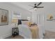 Cozy main bedroom with a comfortable bed, decorative pillows, and natural light at 729 W 32Nd St, Indianapolis, IN 46208
