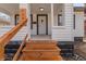 Covered porch with freshly painted door and updated stair railing at 729 W 32Nd St, Indianapolis, IN 46208