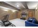 Finished basement offering a spacious area with neutral decor, ideal for various activities and entertainment at 7806 Ashtree Dr, Indianapolis, IN 46259