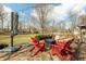 Outdoor patio with comfortable seating arrangements, perfect for enjoying the backyard landscape at 7806 Ashtree Dr, Indianapolis, IN 46259