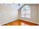 Bedroom featuring a large window with a view of the trees outside at 7914 King Post Dr, Indianapolis, IN 46237