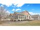 Charming home with stone accents, well-manicured landscaping, and a welcoming facade at 7914 King Post Dr, Indianapolis, IN 46237