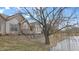 Exterior of the property with attractive stonework and landscaping near a tranquil pond at 7914 King Post Dr, Indianapolis, IN 46237