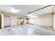 Clean garage with ample space for parking vehicles and includes storage areas with a secure entrance at 7914 King Post Dr, Indianapolis, IN 46237