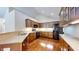 Spacious kitchen featuring granite countertops, wood cabinets, and stainless steel appliances at 7914 King Post Dr, Indianapolis, IN 46237