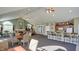 Community center living area with vaulted ceilings, wet bar, and fireplace at 7914 King Post Dr, Indianapolis, IN 46237