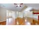 Bright living room with hardwood floors, vaulted ceilings, and an open layout perfect for entertaining at 7914 King Post Dr, Indianapolis, IN 46237