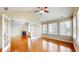 Bright and airy living room featuring hardwood floors, a fireplace, and plenty of natural light at 7914 King Post Dr, Indianapolis, IN 46237