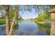Scenic pond view with lush greenery and a serene water feature in the community at 7914 King Post Dr, Indianapolis, IN 46237