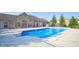 Outdoor pool surrounded by a concrete patio, offering a refreshing amenity at 7914 King Post Dr, Indianapolis, IN 46237
