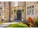 Inviting entryway with a decorative wreath and seasonal decor, enhancing the home's curb appeal at 906 Franklin St, Columbus, IN 47201
