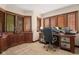 Bright home office with a built-in desk, ample natural light, and custom wood features at 906 Franklin St, Columbus, IN 47201