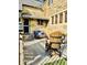 Charming outdoor patio featuring comfortable seating, flower decorations, and access to the main entrance at 906 Franklin St, Columbus, IN 47201