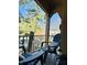 Inviting porch with chairs, table, and a view, perfect for relaxing outdoors at 906 Franklin St, Columbus, IN 47201