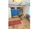 This bedroom features unique mural artwork, laminate floors, and a warm, inviting atmosphere at 911 W 3Rd St, Anderson, IN 46016