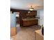 A functional kitchen with a double sink and ample cabinet space, ready for renovation at 911 W 3Rd St, Anderson, IN 46016