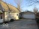 The home features a two-car detached garage and extra driveway parking space at 929 Gilbert Ave, Indianapolis, IN 46227