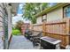 Cozy back patio seating area with patio furniture and a grill, perfect for outdoor entertaining at 960 Cameron St, Indianapolis, IN 46203