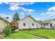 Lush backyard with healthy green grass and partial view of house at 960 Cameron St, Indianapolis, IN 46203