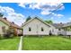 Spacious backyard with well-maintained lawn and the back of the house at 960 Cameron St, Indianapolis, IN 46203