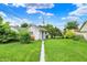 Expansive backyard with lush greenery and a walkway at 960 Cameron St, Indianapolis, IN 46203