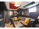 Finished basement living room with movie posters and comfortable seating at 960 Cameron St, Indianapolis, IN 46203