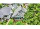 Aerial view of a charming home with brick accents and a lush, landscaped yard in a quiet neighborhood at 960 Cameron St, Indianapolis, IN 46203