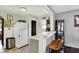 Bright kitchen with stainless steel appliances, adjacent to a breakfast bar with seating at 960 Cameron St, Indianapolis, IN 46203