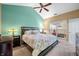 Well-appointed bedroom with vaulted ceilings, large windows, and neutral carpet, promoting relaxation at 112 Bridgemor Ln, Mooresville, IN 46158