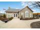 Clubhouse exterior with stone accents, well-kept landscaping and sidewalks leading to the entrance at 112 Bridgemor Ln, Mooresville, IN 46158