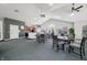 Open common room featuring a kitchen area and seating, ideal for gatherings at 112 Bridgemor Ln, Mooresville, IN 46158