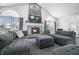 Cozy community room with plush sofas, fireplace, tv and large windows for ample natural light at 112 Bridgemor Ln, Mooresville, IN 46158