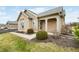 Charming condo featuring stone accents, manicured landscaping, and inviting curb appeal at 112 Bridgemor Ln, Mooresville, IN 46158