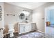 Bright bathroom featuring a double sink vanity, oval mirrors and neutral paint color at 11835 Bengals Dr, Fishers, IN 46037