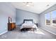Serene bedroom featuring a vaulted ceiling, window, and plush carpet for added comfort at 11835 Bengals Dr, Fishers, IN 46037