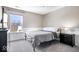 Clean bedroom with carpet, neutral walls, and a window with backyard views at 11835 Bengals Dr, Fishers, IN 46037