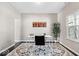 A well-lit home office with modern furniture and decor at 11835 Bengals Dr, Fishers, IN 46037