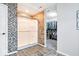Nicely tiled walk in shower featuring glass doors and tile accents, adjoining a walk-in closet at 11835 Bengals Dr, Fishers, IN 46037