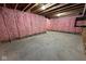 Unfinished basement space with exposed insulation, offering potential for customization and expansion at 1225 Amberley Way, Westfield, IN 46074