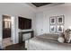 Main bedroom featuring ensuite bath, modern TV and neutral colour scheme at 1225 Amberley Way, Westfield, IN 46074