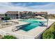 Exterior aerial view of a community pool area with diving board, slide, lap pool, and sunbathing area at 1225 Amberley Way, Westfield, IN 46074