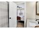 En-suite bathroom with elegant fixtures, quartz countertop and shower at 13 Watson Dr, Trafalgar, IN 46181
