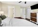 Bright bedroom featuring a spacious layout, closet, and en-suite bathroom at 13 Watson Dr, Trafalgar, IN 46181