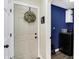 View of the entryway with a door and a partial view of the laundry room at 13 Watson Dr, Trafalgar, IN 46181